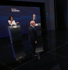 Flávio Bolsonaro (PL) e Lula (PT) se enfrentam no debate da Band neste domingo, 18 Foto: Reprodução/Band TV